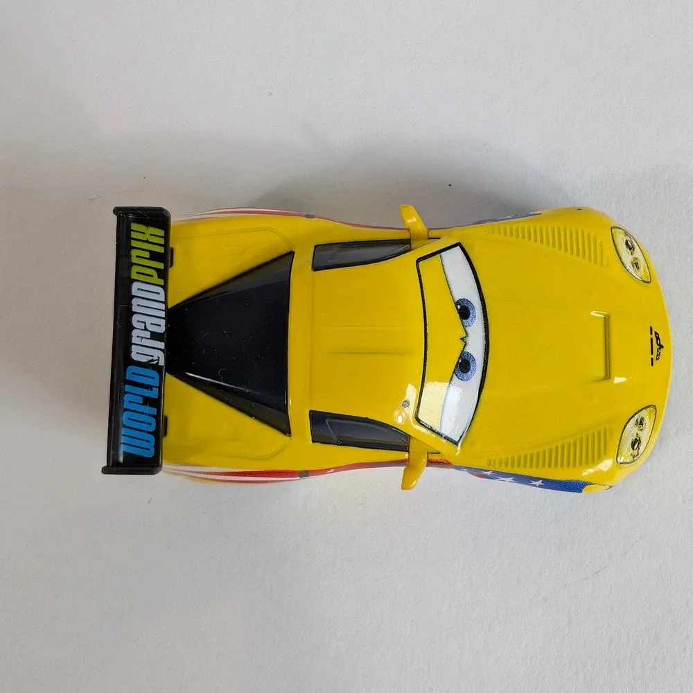 Disney Pixar Cars Jeff Gorvette World Grand Prix Diecast Mattel Yellow Corvette